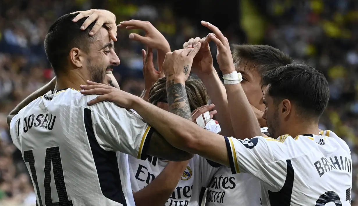 Sementara itu, dua gol dari empat gol Real Madrid dicetak Arda Guler, dan sisanya masing-masing diciptakan Joselu dan Lucas Vazquez.  (JOSE JORDAN / AFP)