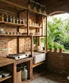 Dapur Batu Bata Ekspos dengan Konsep Semi Outdoor / Desain Dapur Semi Outdoor untuk Rumah Pedesaan (Sumber; gemini.com)