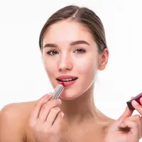 Ilustrasi memakai lipstik/Copyright Freepik/diana.grytsku