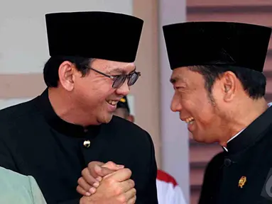 Basuki Tjahaja Purnama (Ahok) dan Abraham Lunggana (Haji Lulung) saat di Lebaran Betawi, Jakarta (14/9/2014) (Liputan6.com/Faisal R Syam)
