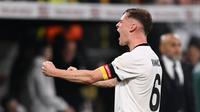 Pemain Jerman, Joshua Kimmich usai mencetak gol ke gawang Italia. (Kirill KUDRYAVTSEV / AFP)