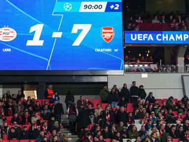 Arsenal sukses menghajar PSV Eindhoven dengan skor telak 7-1 dalam laga leg pertama 16 besar Liga Champions 2024/2025 yang digelar di Philips Stadion, Rabu (5/3/2025) dini hari WIB. (AP Photo/Peter Dejong)