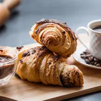 ilustrasi sarapan kopi croissant/PhotoJuli86/Shutterstock