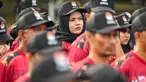 Petugas penyelenggara pemilihan kepala daerah (Pilkada) Gubernur dan Wakil Gubernur Aceh serta Wali Kota dan Wakil Wali Kota Banda Aceh mengikuti Apel Akbar di lapangan Blangpadang, Banda Aceh, Aceh, Sabtu (9/11/2024). (CHAIDEER MAHYUDDIN/AFP)