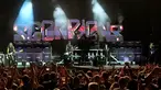 Scorpions dengan vokalis Klaus Meine, gitaris Rudolf Schenker, Matthias Jabs dan basis Pawel Maciwoda saat tampil dalam konser di Stadion Tsirion Limassol, Siprus, Selasa (12/7/2022). Konser Grup Band asal Jerman ini sebagai bagian dari tur peringatan 50 tahun grup mereka dan perilisan album mereka 'Rock Believer'. (AP Photo/Petros Karadjias)