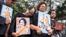 Dikenal sebagai fashionista dan sosok ibu bangsa yang penyayang, Ratu Sirikit Kitiyakara juga dikenal sebagai yang pertama mempromosikan sutra Thailand ke dunia internasional. (Chanakarn Laosarakham/AFP)