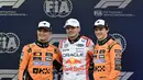 Catatan waktu Max Verstappen melewati waktu Lando Norris 0,012 detik. (Philip FONG/AFP)