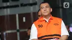 Mantan Wakil Menteri Imigrasi dan Pemasyarakatan (Imipas), Silmy Karim, usai menjalani pemeriksaan di Gedung Merah Putih Komisi Pemberantasan Korupsi (KPK), Senin (8/6/2026). Ini merupakan pemeriksaan perdana Silmy Karim setelah ditetapkan sebagai tersangka dan ditahan KPK pada 4 Juni 2026. (Liputan6.com/Helmi Fithriansyah)