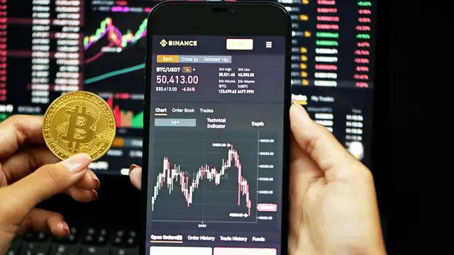 Ilustrasi binance (Foto: Unsplash/Kanchanara)