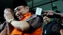 Waryono Karno menghindari pertanyaan wartawan usai menandatangani pelimpahan berkas perkara ke Jaksa Penuntut Umum (P21) di Gedung KPK, Jakarta, Selasa (14/4/2015). (Liputan6.com/Andrian M Tunay)