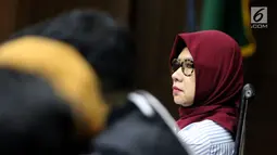 Mantan Dirut PT Pertamina (Persero), Karen Agustiawan saat menjalani sidang lanjutan pemeriksaan saksi-saksi di Pengadilan Tipikor, Jakarta, Kamis (2/5/2019). Sebelumnya, Karen didakwa terlibat dugaan korupsi investasi perusahaan di Blok BMG Australia tahun 2009. (Liputan6.com/Helmi Fithriansyah)