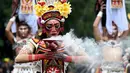 Ogoh-ogoh merupakan seni patung yang dalam kebudayaan masyarakat Bali menggambarkan kepribadian Bhuta Kala. (SONNY TUMBELAKA/AFP)