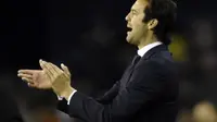 Pelatih Los Blancos, Santiago Solari puas dengan penampilan anak asuh nya saat melawan Celta Vigo pada laga lanjutan pekan ke-12 La Liga 2018/19, Senin (12/11) yang berlangsung di stadion Balaidos, Spanyol. Real Madrid menang 4-2. (AFP/Miguel Riopa)