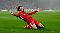 Pemain Liverpool, Curtis Jones merayakan golnya ke gawang Leicester pada laga lanjutan Liga Inggris 2024/2025 di Anfield, Liverpool, Inggris, Jumat (27/12/2024) WIB. (AFP/Paul Ellis)