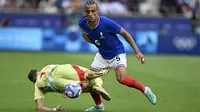 Spanyol U-23 tampil tangguh untuk mengalahkan tuan rumah Prancis U-23 dengan skor 5-3 dalam duel 120 menit. (PATRICIA DE MELO MOREIRA / AFP)