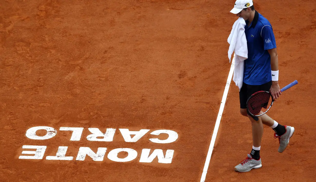 Ekspresi John Isner usai ditaklukkan Rafael Nadal  (REUTERS/Eric Gaillard)