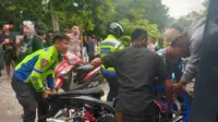 Polsek Kota Barat, Kota Gorontalo berhasil mengamankan belasan motor yang hendak melakukan balap liar (Arfandi Ibrahim/Liputan6.com)
