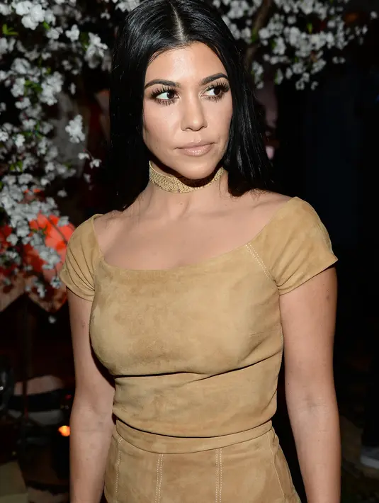 "Scott dan kedua adikku tidak berhubungan apa-apa, mereka hanya sekedar saudara dekat. Tolong jangan berasumsi hal yang aneh," tandas Kourtney. (AFP/Bintang.com)