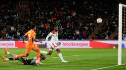 Amad Diallo membuka keunggulan Pantai Gading pada menit ke-20. Amad dengan lincah melewati dua pemain bertahan sebelum menaklukkan kiper Herve Koffi lewat sontekan cerdik dari jarak dekat. (AP Photo/Themba Hadebe)