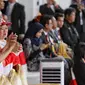 Presiden Joko Widodo dan Menko PMK Puan Maharani aat acara api obor Asian Games 2018 sebelum upacara penurunan Bendera Merah Putih di Istana Negara Jakarta, Jumat (17/8). (Liputan6.com/Pool/Eko)