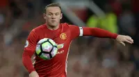 Kapten Manchester United, Wayne Rooney. (AFP/Oli Scarff)