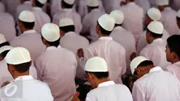 Suasana acara Khatam Al-Quran warga binaan pemasyarakatan di LP Cipinang, Jakarta, Kamis (20/4). Acara ini dihadiri sejumlah menteri. (Liputan6.com/Johan Tallo)