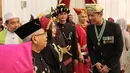 Putra Presiden RI ke-6 SBY, Agus Harimurti Yudhoyono atau AHY berbincang dengan Wakil Presiden terpilih Ma'ruf Amin dan istri Wury Estu Handayani usai Upacara HUT ke-74 RI di Istana Merdeka, Jakarta, Sabtu (17/8/2019). (Liputan6.com/HO/Anung Aninditio)