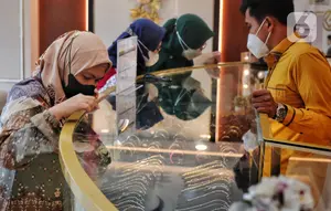 Harga Emas 24 Karat Kompak Turun: Antam, Pegadaian, dan Hartadinata