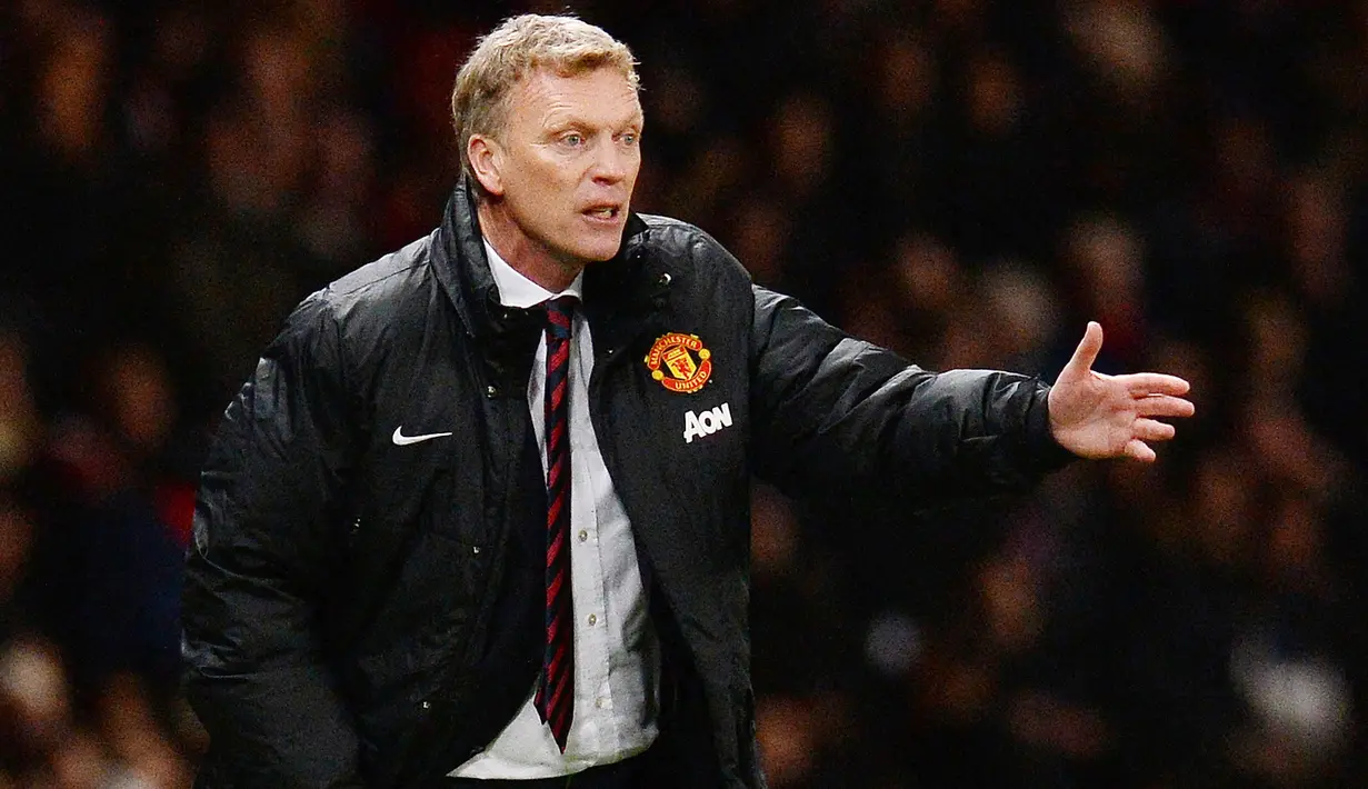 David Moyes - Pelatih yang ditunjuk langsung oleh Sir Alex Ferguson untuk menjadi penggantinya ternyata kariernya kurang mulus di Old Trafford. Meski hanya melatih selama 10 bulan namun Moyes sempat mempersembahkan satu gelar juara, yakni Community Shield. (AFP/Andrew Yates)