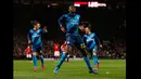 Penyerang Arsenal, Danny Welbeck merayakan selebrasi usai mencetak gol ke gawang Manchester United saat laga perempat final Piala FA di Stadion Old Trafford, Inggris (10/3/2015). Arsenal Menang 2-1 atas Manchester United.(Reuters/Jason Cairnduff )