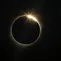 Bulan menghalangi matahari selama gerhana matahari total di La Higuera, Chile, Selasa (2/7/2019). Gerhana matahari total secara singkat mengubah siang menjadi malam. (AP Photo/Esteban Felix)