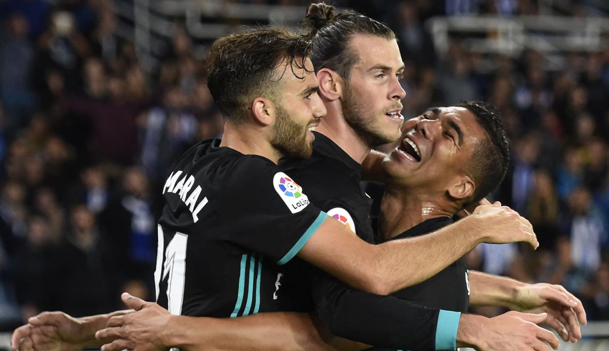 <p>Gareth Bale mengumumkan kabar mengenai pensiunnya dari dunia sepak bola pada Senin (9/1/2023) waktu setempat. Pria asal Wales itu telah menghabiskan 8 tahun bersama Real Madrid sebelum dilepas ke klub Amerika Serikat, Los Angeles FC dengan status free transfer. Ia didatangkan ke Santiago Bernabeu di era Carlo Anceloti bersama empat rekrutan lain. Berikut ini nasib 4 rekan seangkatan Gareth Bale di Real Madrid. (AFP/Ander Gillenea)</p>