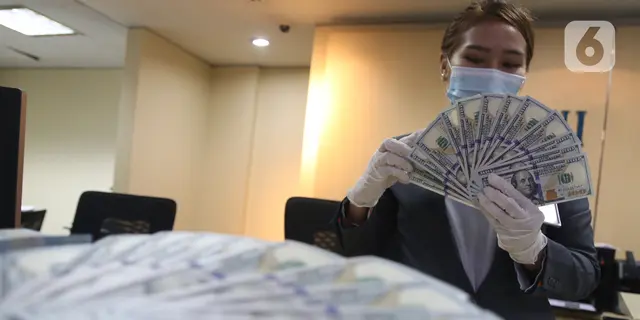 Jurus BI Bentengi Rupiah dari Gejolak Dolar AS
