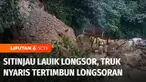 Sebuah truk nyaris tertimbun longsor saat melintasi jalur Sitinjau Lauik, Kota Padang, Sumatra Barat, Jumat siang. Material longsor menutupi jalan dan membuat jalur alternatif Padang-Bukittinggi ini macet panjang.
