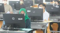 Pelaksanaan Ujian Tulis Berbasis Komputer-Seleksi Nasional Berdasarkan Tes (UTBK-SNBT) 2023 digelar serentak pada Senin (8/5/2023). (merdeka.com/Arie Basuki)