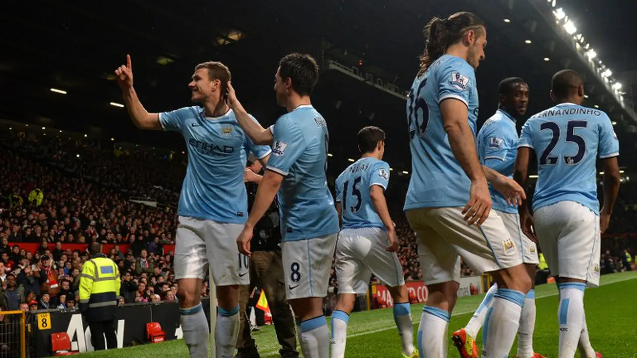 Selebrasi Gol ke-2 Edin Dzeko (PAUL ELLIS / AFP)