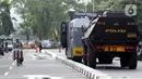 Kendaraan taktis milik kepolisian disiagakan di jalan Kuningan Persada sekitar Gedung Merah Putih KPK, Jakarta, Selasa (1/6/2021). Pengamanan gedung KPK dan sekitarnya diperketat terkait upacara pelantikan pegawai KPK menjadi Aparatur Sipil Negara. (Liputan6.com/Helmi Fithriansyah)