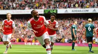 Striker Arsenal, Alexandre Lacazette usai mencetak gol ke gawang Burnley (Daniel -Leal Olivas/AFP)