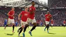 Striker Manchester United, Marcus Rashford, merayakan gol yang dicetaknya ke gawang Leicester pada laga Premier League 2019/2020 di Stadion Old Trafford, Manchester, Sabtu (14/9). MU menang 1-0 atas Leicester. (AFP/Oli Scarff)