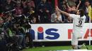 Selebrasi dengan gaya memanah dianggapnya sebagai simbol bahwa setiap kali mendapatkan bola, ia harus fokus untuk menembakkannya ke arah gawang. (Foto: AFP/Jean-Francois Monier)