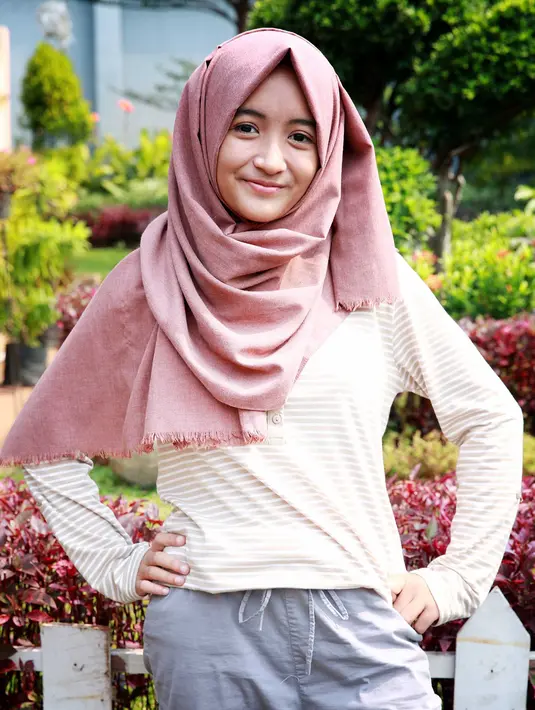 Curahan hatinya sering dijadikan materi dalam penampilannya. Dengan banyaknya orang tertawa, ia merasakan lega. Arafah sebelumnya pernah mengikuti Stand Up Comedy Depok dan kampusnya, UIN. (Deki Prayoga/Bintang.com)