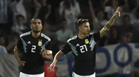 Selebrasi Paolo Dybala usai mencetak gol kedua timnas Argentina ke gawang Meksiko Meksiko pada laga persahabatan yang berlangsung di stadion Malvinas, Rabu (21/11). Argentina menang 2-0 atas Meksiko (AFP/Andres Larrovere)