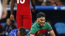 Suporter Portugal ditangkap petugas keamanan saat Portugal melawan Polandia pada perempat final Piala Eropa 2016 di Stade Velodrome, Marseille, (1/7/2016) dini hari WIB.  (REUTERS/Michael Dalder)
