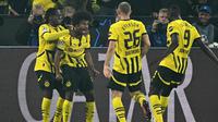 Tiga gol Karim Adeyemi pada menit ke-11, 29 dan 42 mempertebal keunggulan Borussia Dortmund. (INA FASSBENDER/AFP)
