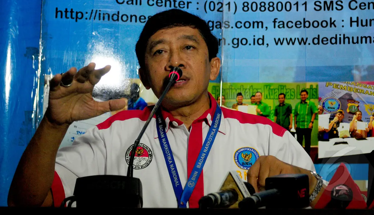 Kepala Humas Badan Narkotika Nasional (BNN) Kombes Pol Slamet Pribadi saat melakukan konferensi pers terkait kaburnya 10 tahanan dari sel tahanan BNN, Jakarta, Selasa (31/3/2015). (Liputan6.com/Yoppy Renato)