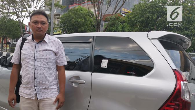 Rizaldy Arief Ramadhan, salah satu mitra pengemudi Grab Car. (Liputan6.com/ Andina Librianty)