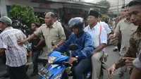Usai berkampanye di Pasar Tanah Abang capres Prabowo naik ojek dan menghilang. (Liputan6.com/Johan Tallo)