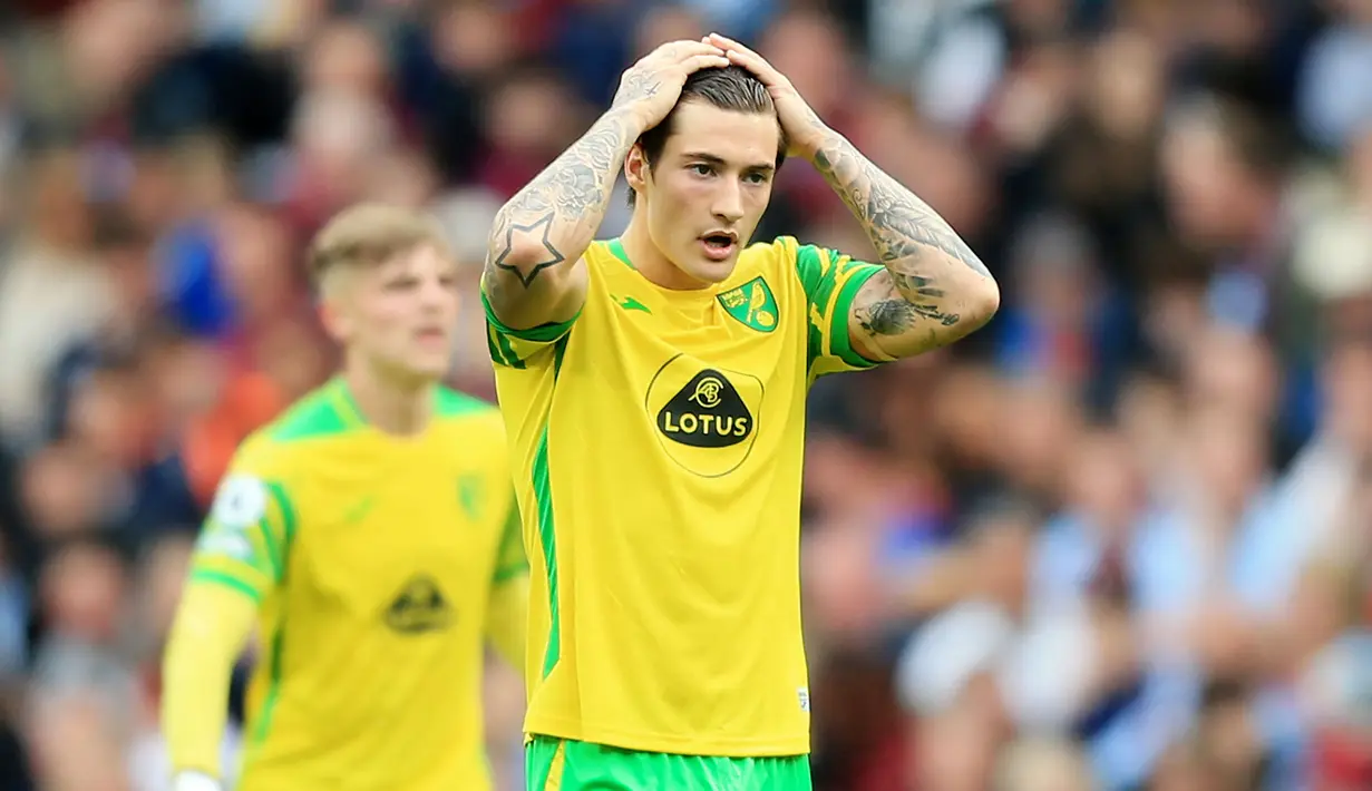 Norwich City menjadi klub pertama yang terlempar dari Liga Inggris. The Canaries hanya mampu mengumpulkan 22 poin di sepanjang musim 2021/2022. (AFP/Lindsey Parnaby)