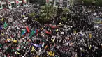 Warga Iran berunjuk rasa di Alun-Alun Palestina, Teheran pada 9 April 2025. (ATTA KENARE/AFP)