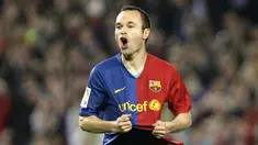 Barcelona's Andres Iniesta celebrates after scoring against Sevilla during a Liga football match at the New Camp Stadium in Barcelona , on April 22, 2009. AFP PHOTO/JOSEP LAGO